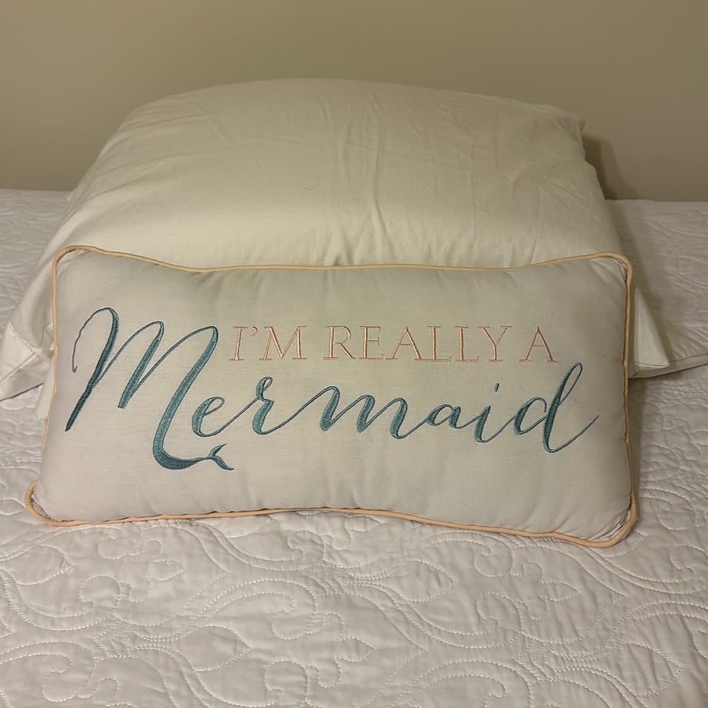“I’m Really A Mermaid” bed pillow.  Light cream / off-white color